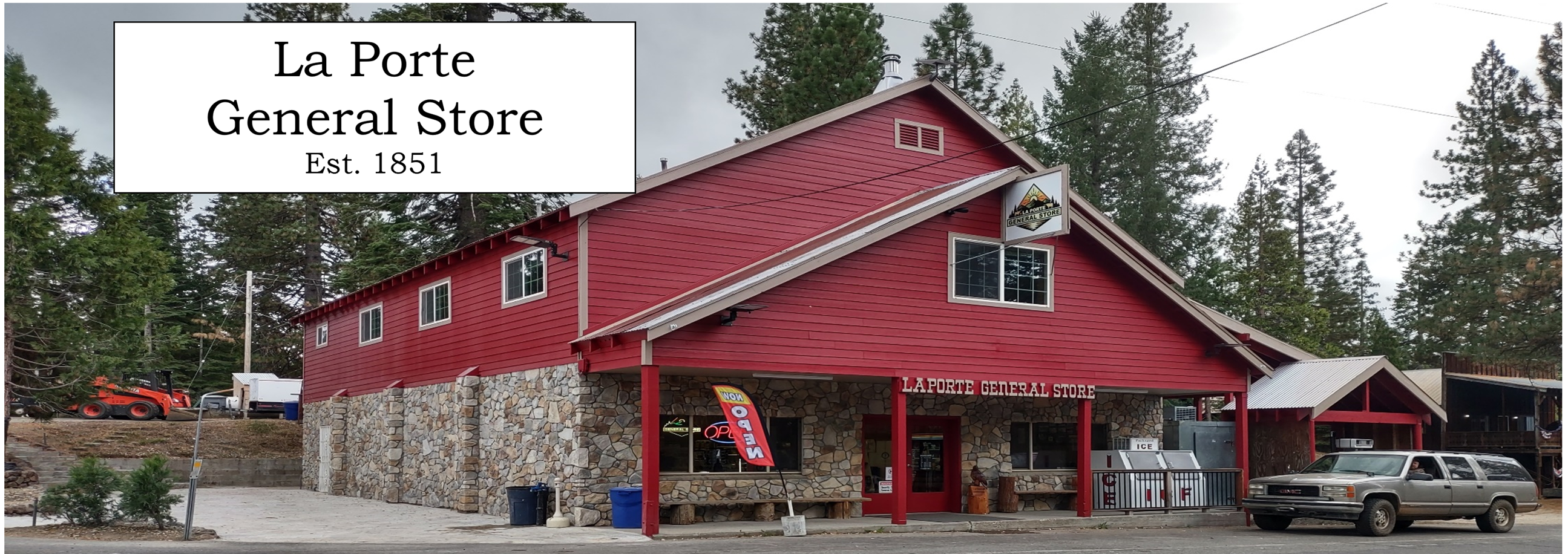A building with a red roof

Description automatically generated